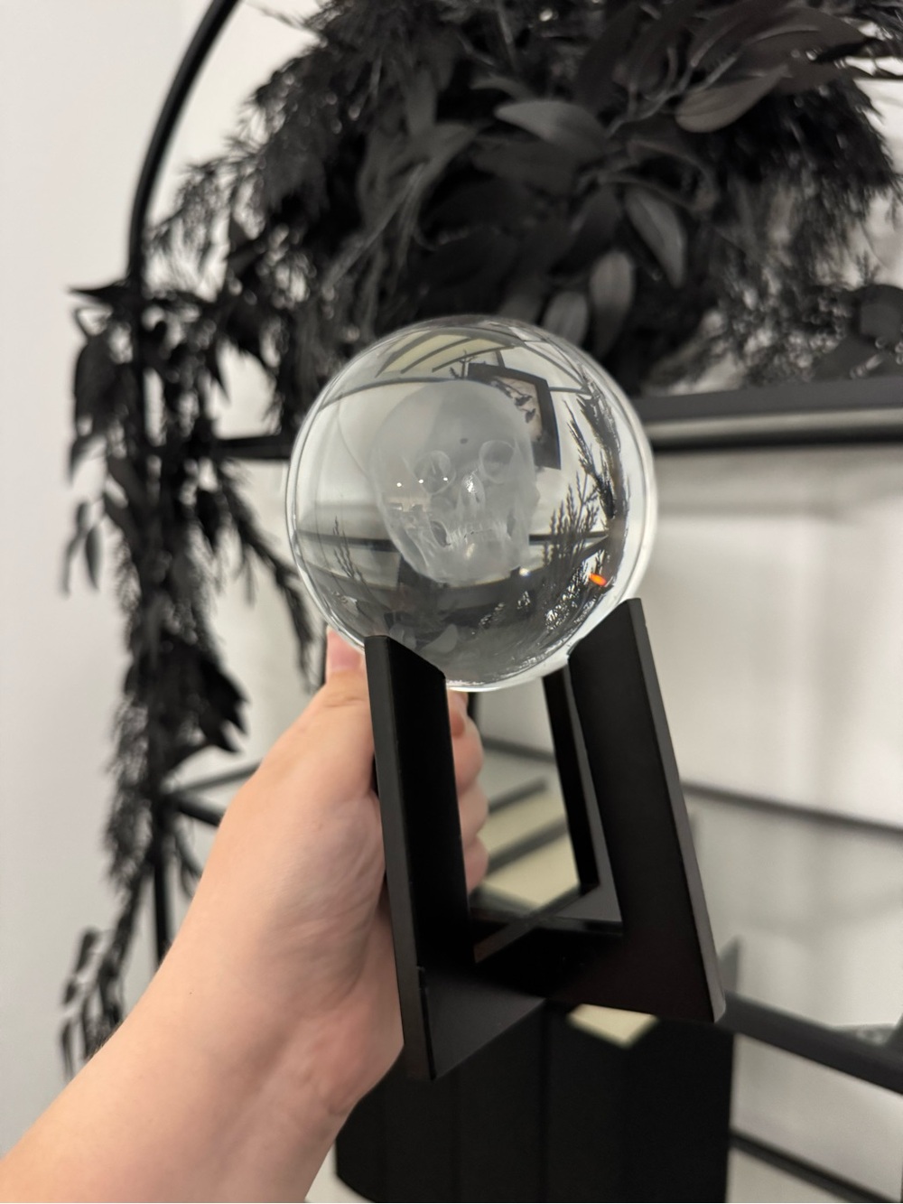 Glass Skull Crystal Ball on Black Stand